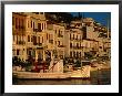 19Th Century Buildings And Fishing Vessels In Gythio Harbour, Gythio, Peloponnese, Greece by Glenn Beanland Limited Edition Print