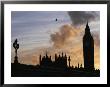 Silhouetted View Of Big Ben And Westminster Abbey Against A Twilight Sky by Jodi Cobb Limited Edition Print