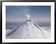 Shishaldin Volcano, One Of Many Active Volcanoes In The Aleutian Chain by Joseph Baylor Roberts Limited Edition Print
