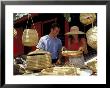 Couple Shopping For Baskets At Straw Market, Bahamas, Caribbean by Greg Johnston Limited Edition Print