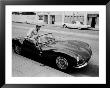 Actor Steve Mcqueen Getting Into His Jaguar by John Dominis Limited Edition Print