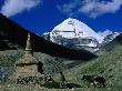 Stupa Assembled Of Roughly Carved Stones At Mt. Kailash, Sacred Mountain Peak, Mt. Kailash, Tibet by Bill Wassman Limited Edition Print