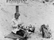 Funny Picture Of Lady On Beach Under 'Dangerous' Sign by Shirley Baker Limited Edition Print