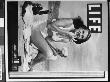 Life Cover Featuring Rita Hayworth Eating A Hamburger, Sunbathing In A White Swimsuit At The Beach by Bob Landry Limited Edition Print