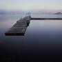 A Wooden Wharf On Still Water In Misty Weather by Mikael Andersson Limited Edition Print