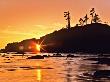 Sunset Starburst In Hole Of Quateata Headland, Second Beach, Washington, Usa by Charles Crust Limited Edition Print