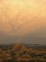 A Landscape Of Isolated Buttes And Rock Fragments Near Cedar Pass by Annie Griffiths Limited Edition Print