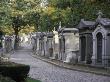 Summer View Of A Cemetery Street With Rows Of Family Tombs And Trees by Stephen Sharnoff Limited Edition Pricing Art Print