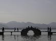 People Crossing A Bridge Over A Lake In Twilight, China by Ryan Ross Limited Edition Pricing Art Print