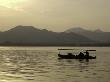 Twilight View Of A Small Boat On West Lake, China by Ryan Ross Limited Edition Pricing Art Print