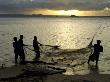 Fishermen Pulling In The Nets At Dawn, Ramena Beach, Diego Suarez, North Madagascar by Inaki Relanzon Limited Edition Print