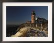 Morning Sunlight Strikes The West Quoddy Head Lighthouse, Lubec, Maine by Michael C. York Limited Edition Print