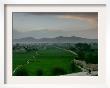 An Afghan Man Rides His Bicycle On A Dirt Road On The Northern Edge Of Kabul, Afghanistan by David Guttenfelder Limited Edition Print