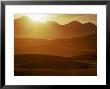 Silhouetted Mountain Range At Sunrise by Rick Raymond Limited Edition Print