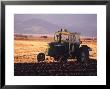 Farmer Plows Barley Field, San Luis Valley, Co by Gary Conner Limited Edition Print