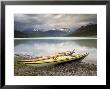 Kayaks On The Shore Kintla Lake, Montana, Usa by Mike Tittel Limited Edition Print
