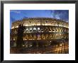 The Colosseum At Night With Traffic Trails, Rome, Lazio, Italy by Christian Kober Limited Edition Print