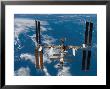 The International Space Station Moves Away From The Space Shuttle Atlantis, June 19, 2007 by Stocktrek Images Limited Edition Pricing Art Print