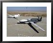 Two Global Hawks Parked On A Ramp by Stocktrek Images Limited Edition Print