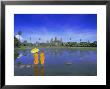 Buddhist Monks Standing In Front Of Angkor Wat, Siem Reap, Cambodia by Gavin Hellier Limited Edition Print