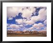 Cumulous Clouds Over The Vermillion Cliffs by John Eastcott & Yva Momatiuk Limited Edition Print