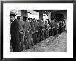 Hotel Porters Waiting For Zurich St. Moritz Train Arrival by Alfred Eisenstaedt Limited Edition Print
