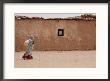 A Refugee From Western Sahara Leaves A Red Cross Food Distribution Center by Steve Raymer Limited Edition Pricing Art Print