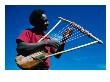 Man Playing Local Stringed Instrument At Kebirigo, Kenya by Eric Wheater Limited Edition Print