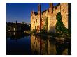 Hever Castle Reflected In Moat In Autumn, Kent, England by David Tomlinson Limited Edition Print