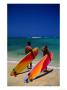 Couple With Colourful Surfboards On Beach Near Waikiki, Waikiki, U.S.A. by Ann Cecil Limited Edition Print