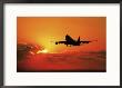 Passenger Jet Airplane Taking Off At Dusk by Peter Walton Limited Edition Print