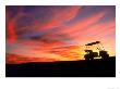 Silhouette Of A Golf Cart At Sunset by Rick Raymond Limited Edition Print