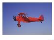 Red Bi-Plane In Flight by Larry Mcmanus Limited Edition Print