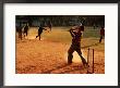Cricket Batsman Swings On Dusty Pitch, Fort Cochin, India by Anthony Plummer Limited Edition Print