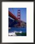 Surfer And Golden Gate Bridge, San Francisco, California, Usa by Roberto Gerometta Limited Edition Print