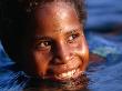 Child Playing In The Water, Manam Island, Madang, Papua New Guinea by Jerry Galea Limited Edition Print