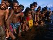 Children Playing In Water, Manam Island, Madang, Papua New Guinea by Jerry Galea Limited Edition Pricing Art Print