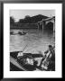 Man Playing Cello On Boat by Loomis Dean Limited Edition Print