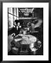 Shopper Looking At Selection Of Chocolates In Elegant Fifth Avenue Candy Store by Alfred Eisenstaedt Limited Edition Print