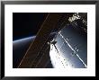 Portion Of The International Space Station's Columbus Laboratory And Solar Array Panels by Stocktrek Images Limited Edition Pricing Art Print