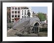 Halfpenny Bridge Over The River Liffey, Dublin, Eire (Republic Of Ireland) by Philip Craven Limited Edition Print