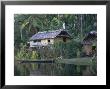 Houses And Boat, Sepik River, Papua New Guinea by Sybil Sassoon Limited Edition Print