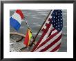 American Flag And Signal Flags Hanging From The Stern Of A Sailboat, Mystic, Connecticut by Todd Gipstein Limited Edition Print