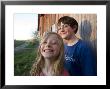 Two Siblings Play Near An Old Barn In Nebraska by Joel Sartore Limited Edition Pricing Art Print