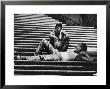 Two Young Italian Workmen Loafing On The Spanish Steps During Lunch Hour by Paul Schutzer Limited Edition Pricing Art Print