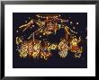 Lit Display Of Traditional Pinata And Children In Candlelight Procession During Christmas Festival by John Dominis Limited Edition Print