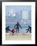 Person Cycling Past Sculptures On Han River Cycleway, Sinchon And Yeouido, Seoul, South Korea by Anthony Plummer Limited Edition Print