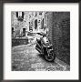 Motor Scooter By Buildings In Square, Italy by Eric Kamp Limited Edition Print