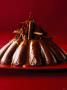 Chocolate Dessert With Grated Chocolate On Red Plate by Jã¶Rn Rynio Limited Edition Print