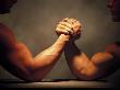 Close-Up Of Two Men Arm Wrestling by David Burch Limited Edition Print